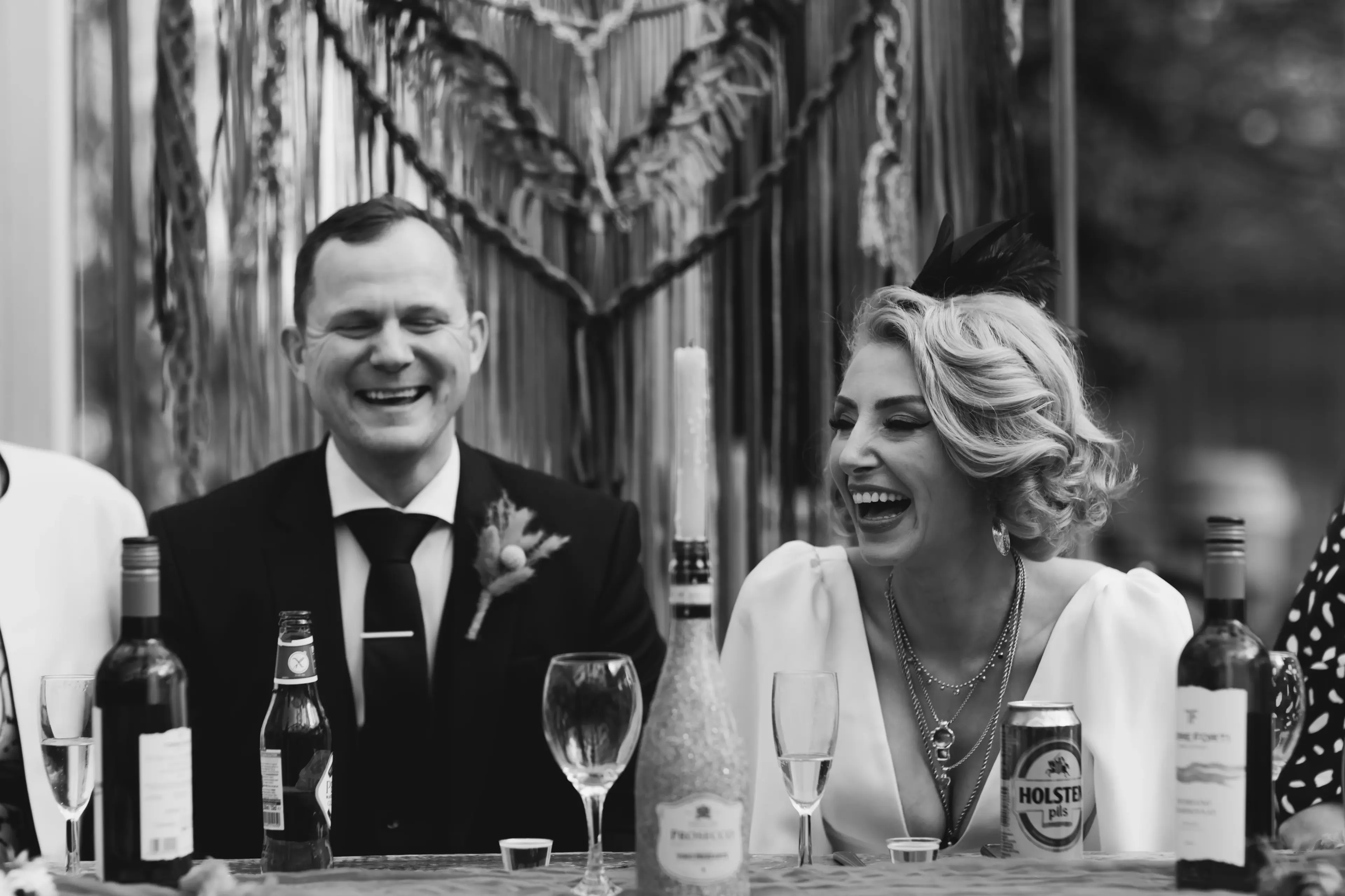 Bride and groom laughing together at the People's Park Tavern, Hackney, London