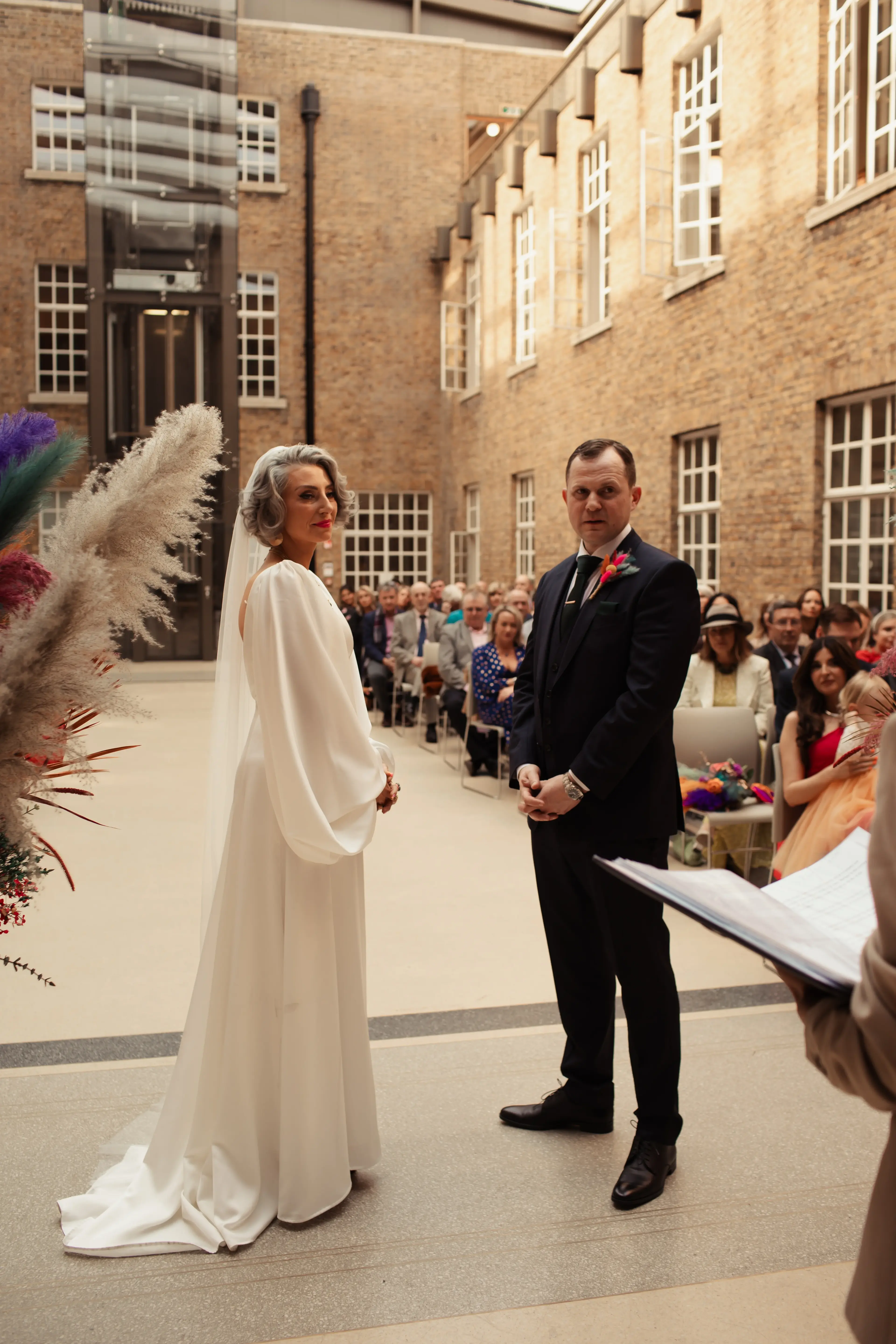 Bride and groom at their wedding ceremony at Hackney Town Hall