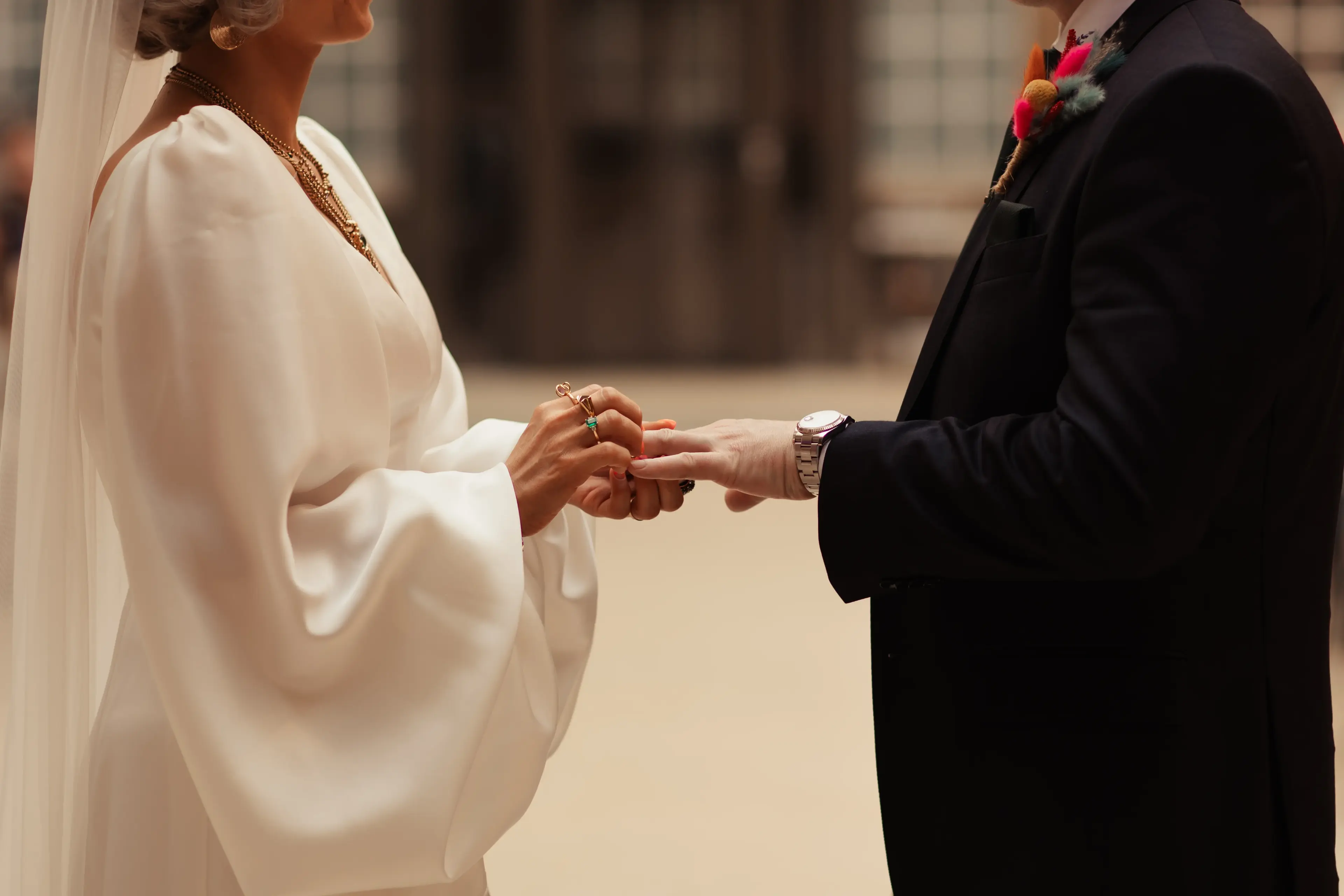 Bride and groom exchanging rings at Hackney Town Hall, London