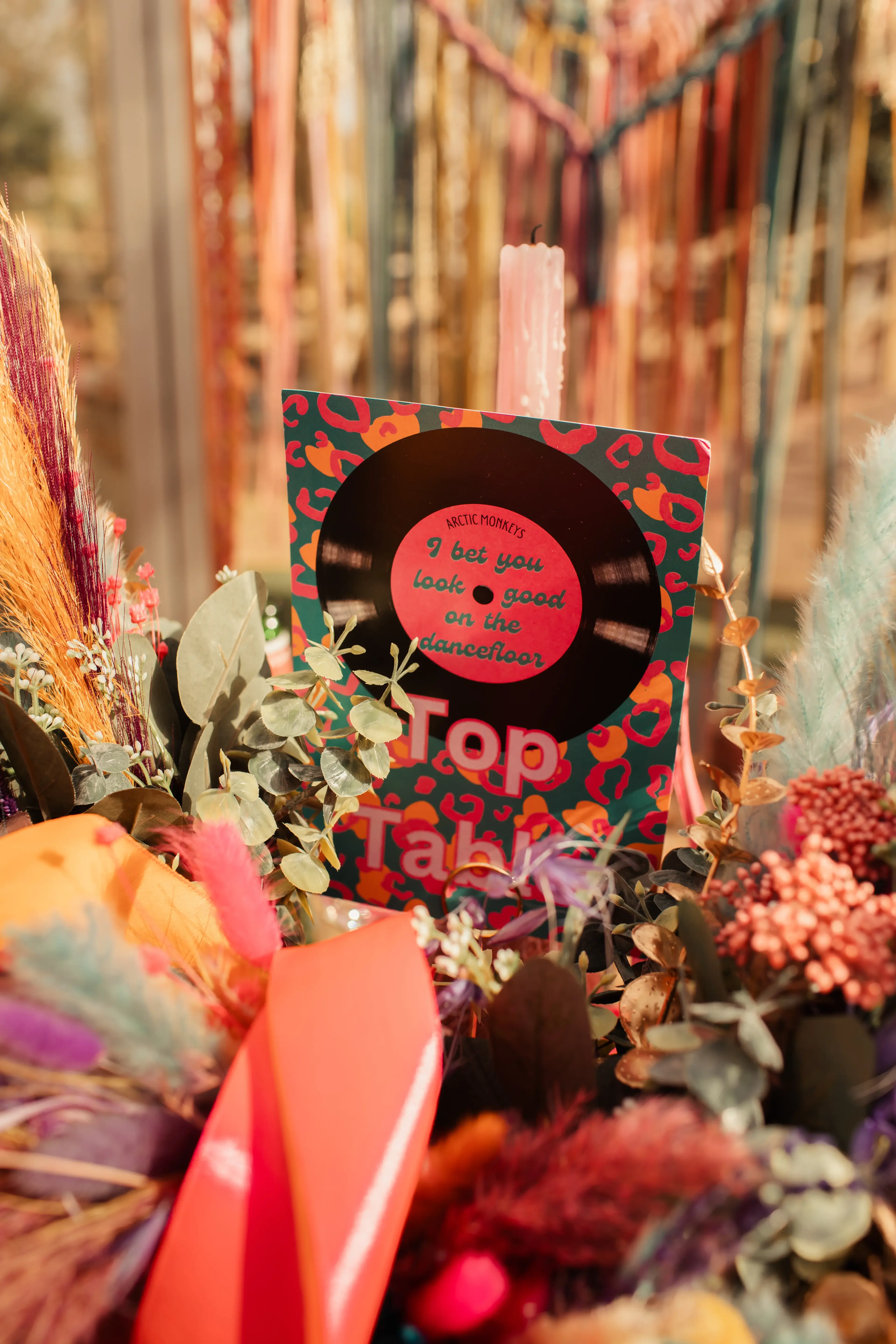 Some Arctic Monkeys themed table signage for a London pub wedding reception