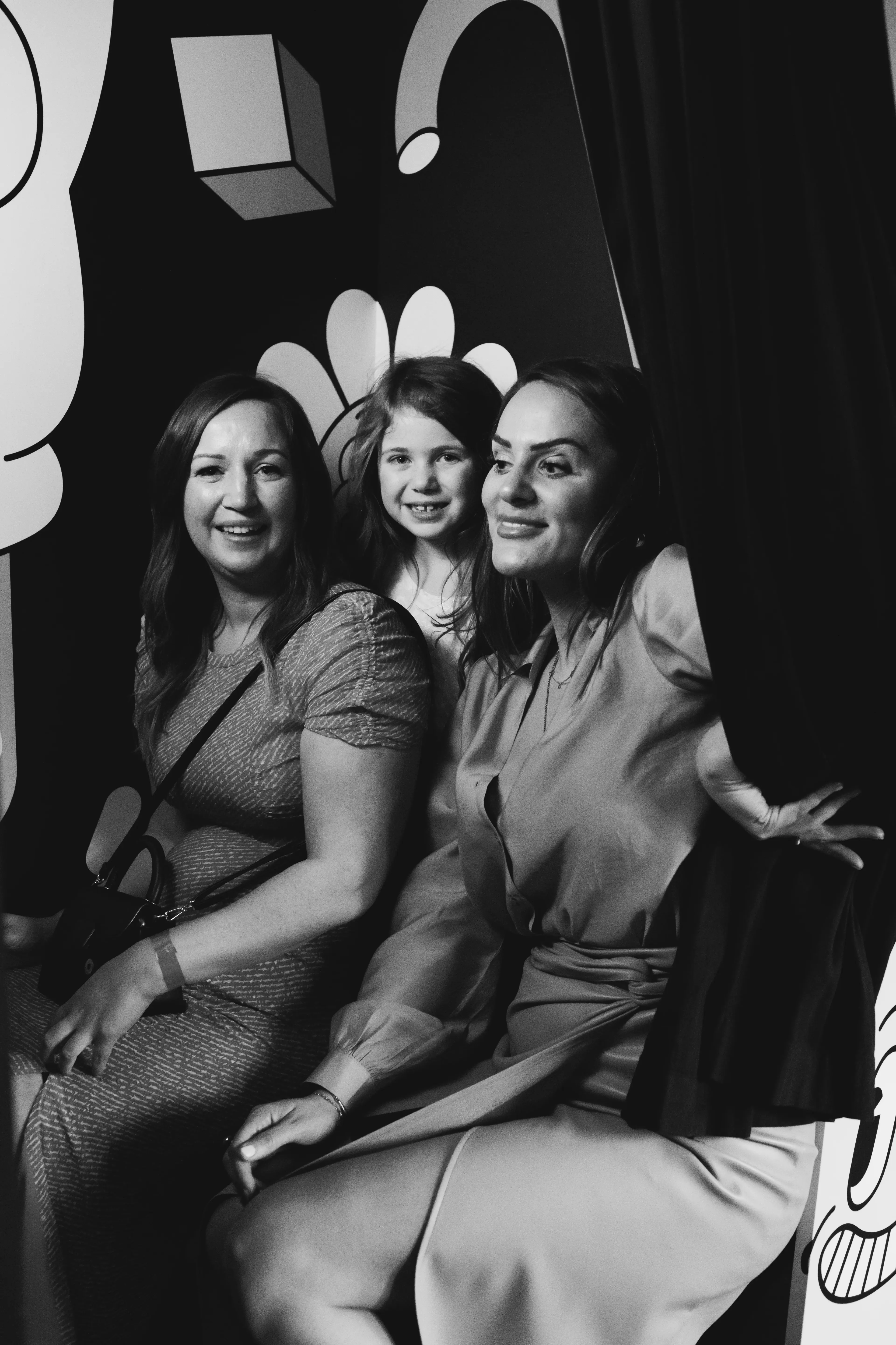 Some wedding guests having a photo taken in a photobooth at the People's Park Tavern, Hackney